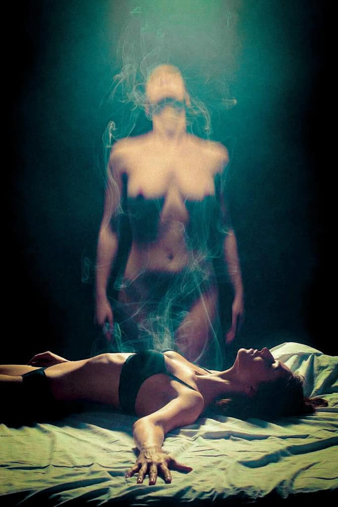 Surreal image of a woman on a bed with a ghostly figure rising, representing an out-of-body experience.