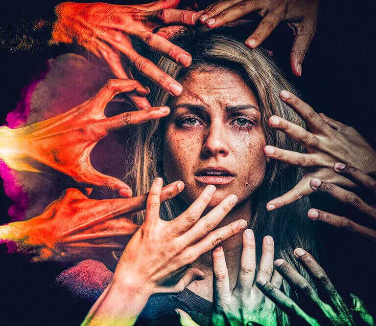 Illustration of a distressed woman surrounded by many reaching hands.