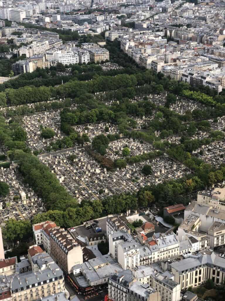 Aerial view of Montparnasse Cemetery and surrounding Paris buildings.