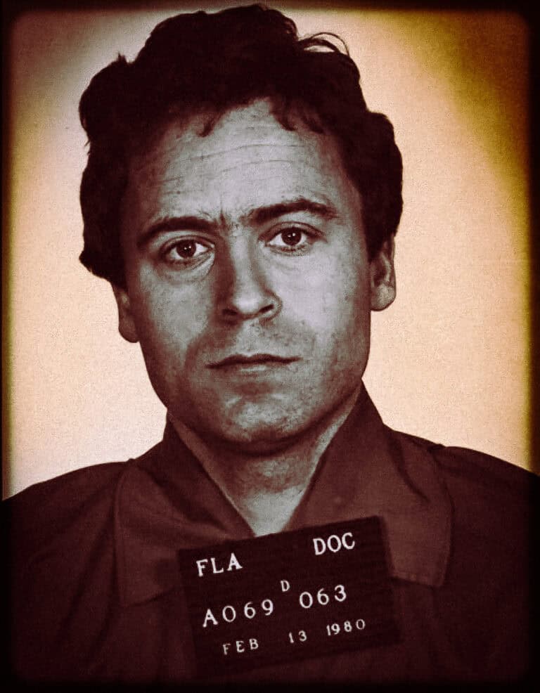 Black and white police mugshot of Ted Bundy facing the camera.