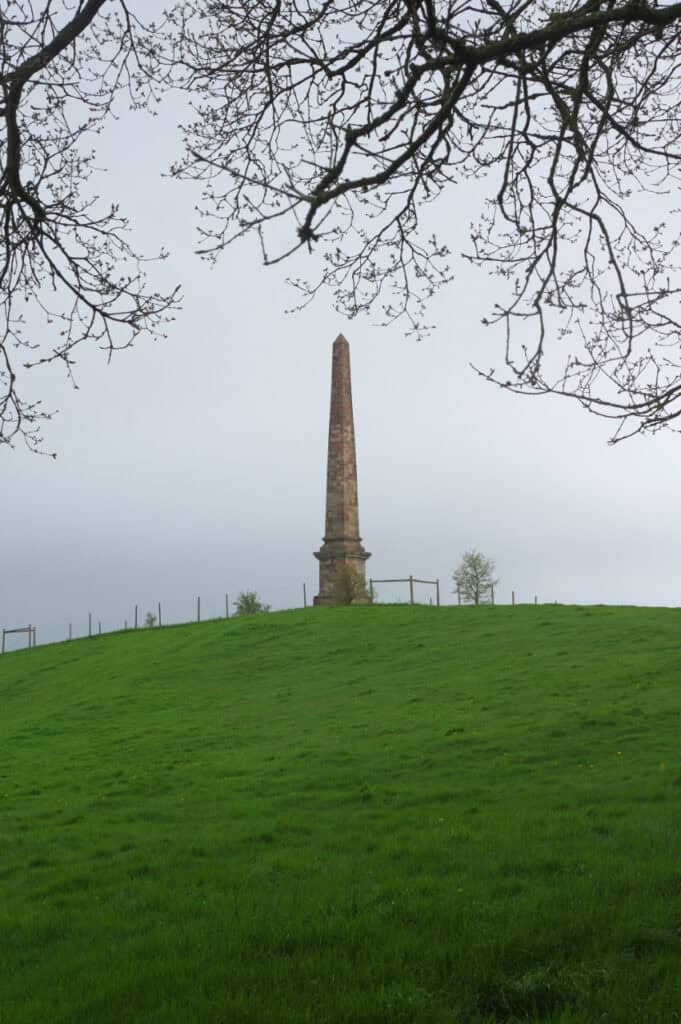 The Wychbury Obelisk near Hagley Wood, 2018, where the "Who put Bella" slogan has been painted repeatedly since at least