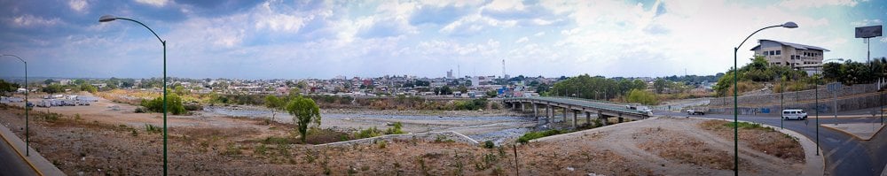 Panoramic view of the rooftops of Tapachula, Chiapas, with green hills behind