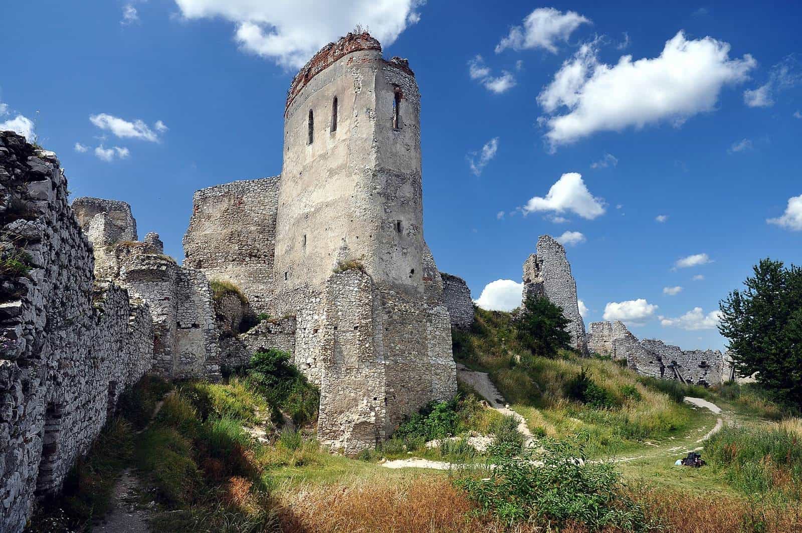 The ruins of Čachtice Castle on a wooded hilltop in western Slovakia