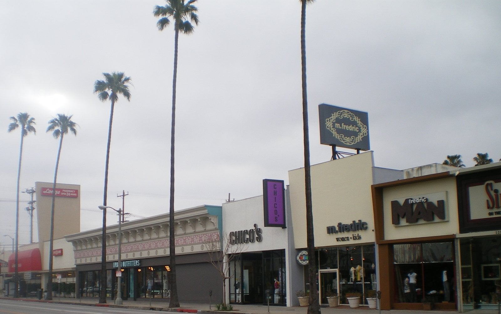 Shops and traffic along Ventura Boulevard in Studio City, Los Angeles, on a clear day