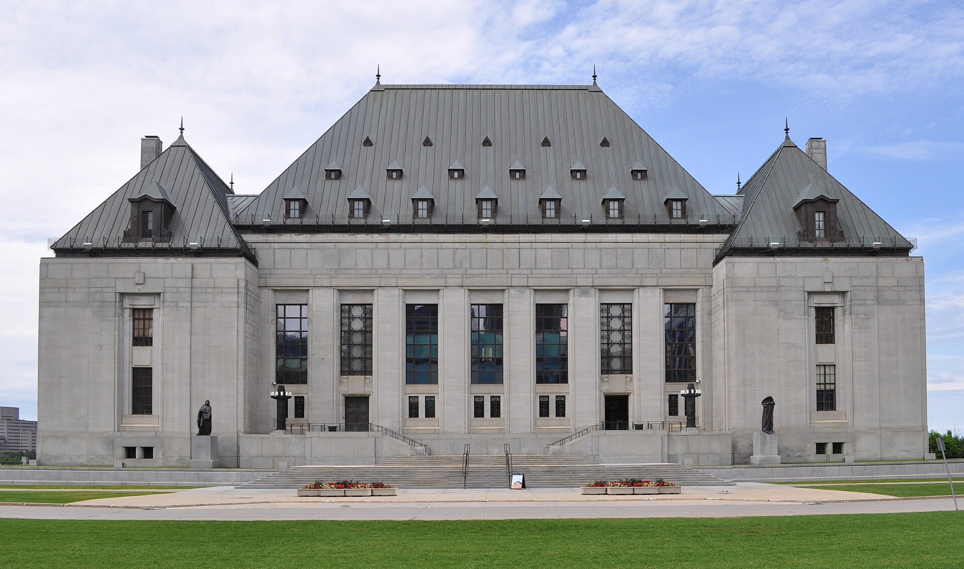 The Supreme Court of Canada building in Ottawa with its copper roofs, seen in summer